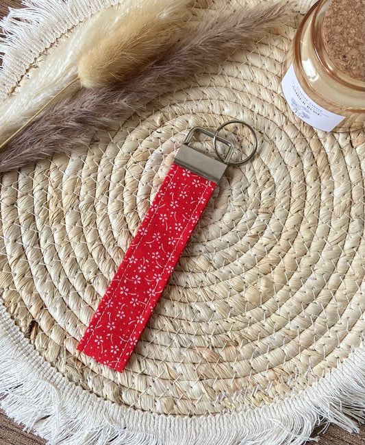 Porte clé fleuri rouge