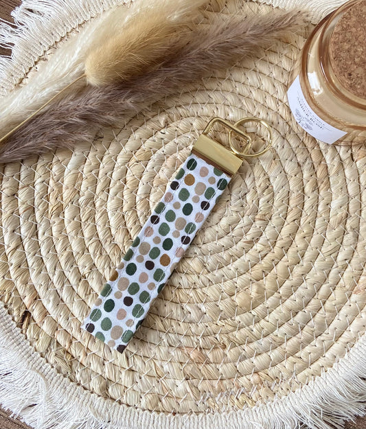 Porte clé pois vert